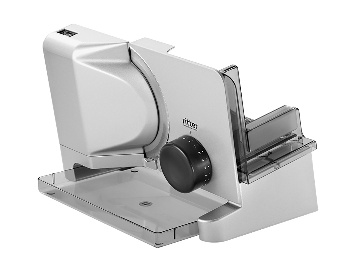 Electric food slicer in silver, angled view