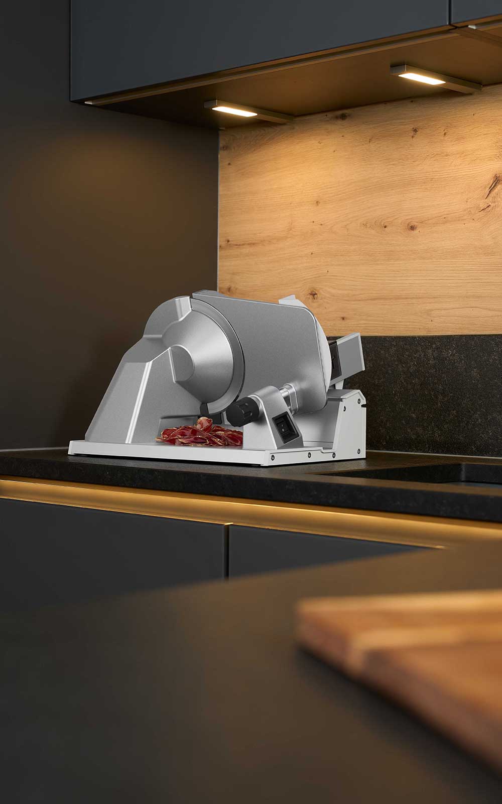 Deli slicer that stands in a kitchen. Deli slicer that stands in a kitchen.