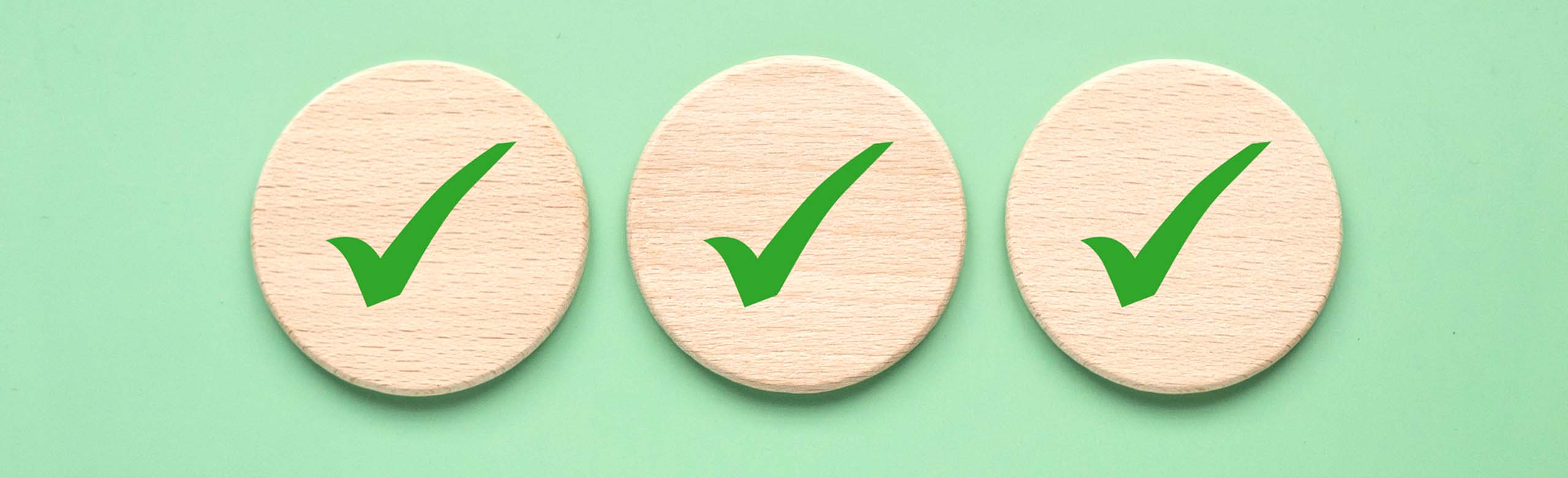 3 hooks in circle with green background